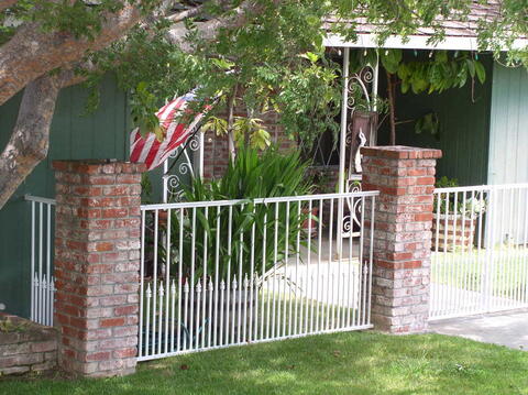 White powder-coated iron fence