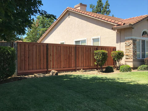 Combination wood and iron fence