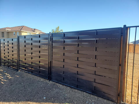 Woven pattern custom iron fence